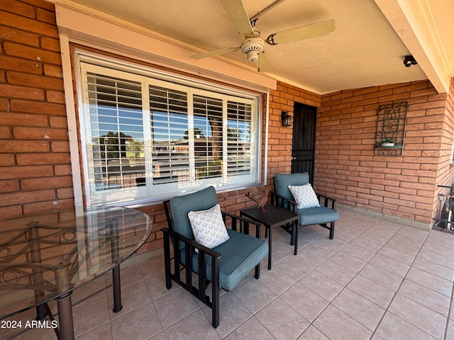 view of patio / terrace featuring ceiling fan