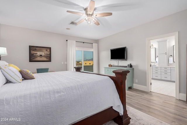 bedroom featuring access to exterior, visible vents, connected bathroom, baseboards, and light wood-type flooring