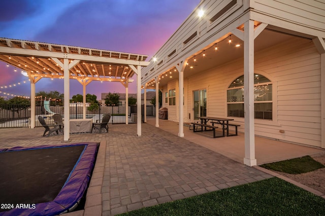 view of patio / terrace with fence and a pergola