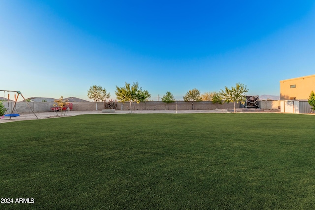 view of yard featuring fence