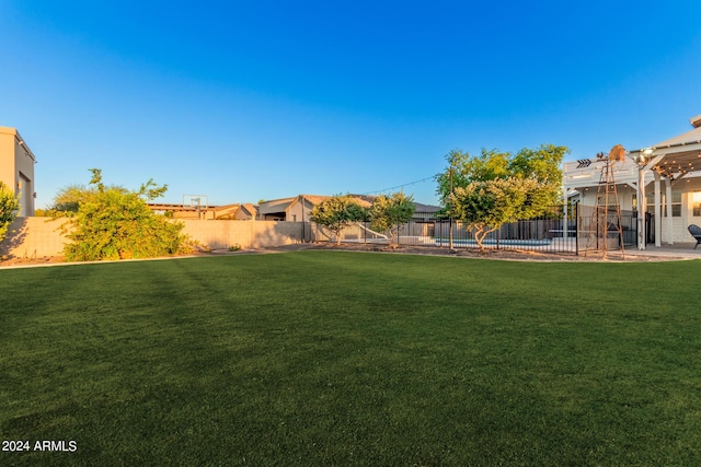 view of yard featuring a fenced backyard