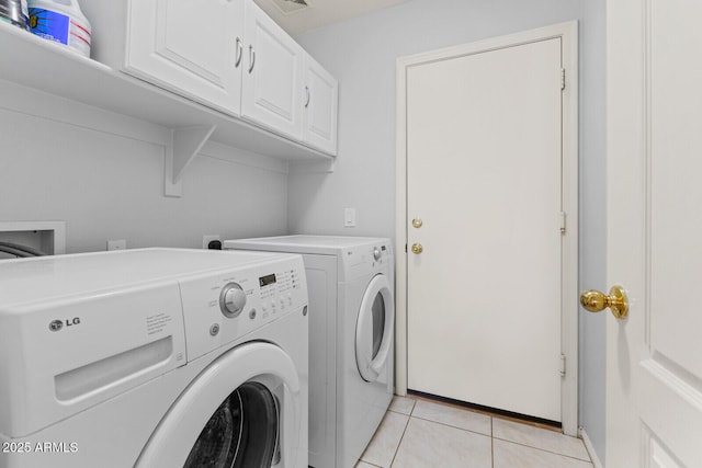878 E Mountain View Rd, San Tan Valley, AZ 85143 - laundry area featuring independent washer and dryer, cabinet space, and light tile patterned flooring