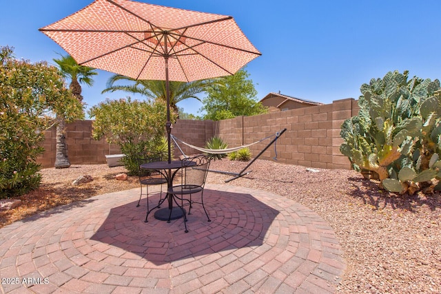878 E Mountain View Rd, San Tan Valley, AZ 85143 - fenced backyard featuring a patio area and outdoor dining area