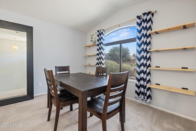 878 E Mountain View Rd, San Tan Valley, AZ 85143 - carpeted dining space featuring lofted ceiling and baseboards