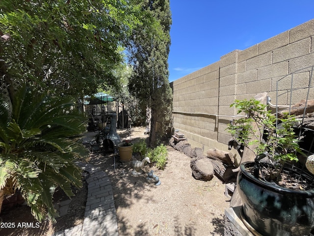 view of yard featuring fence