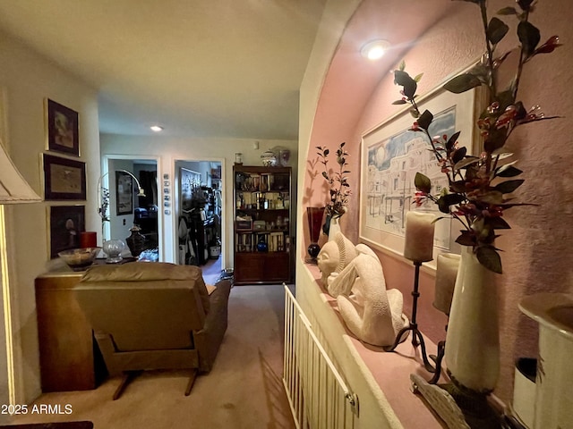 carpeted living area featuring recessed lighting