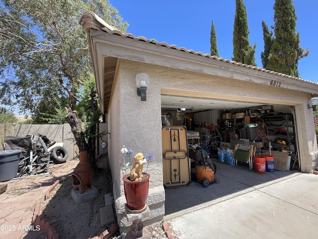 garage with driveway