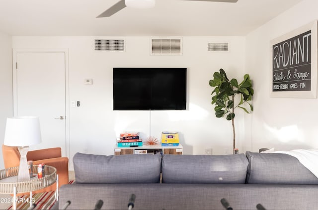 living room featuring ceiling fan