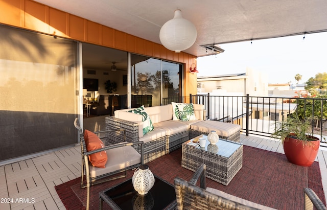 view of patio with a balcony and an outdoor hangout area