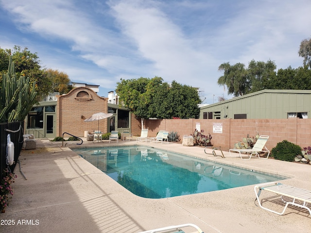 view of pool featuring a patio