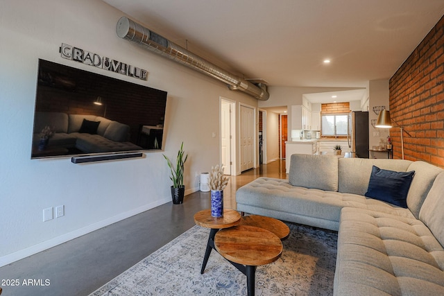 living room with brick wall