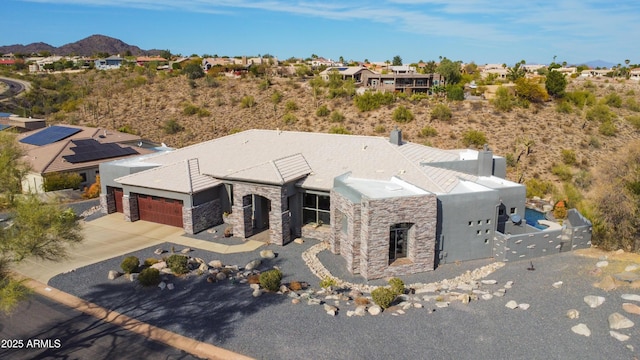 drone / aerial view featuring a mountain view