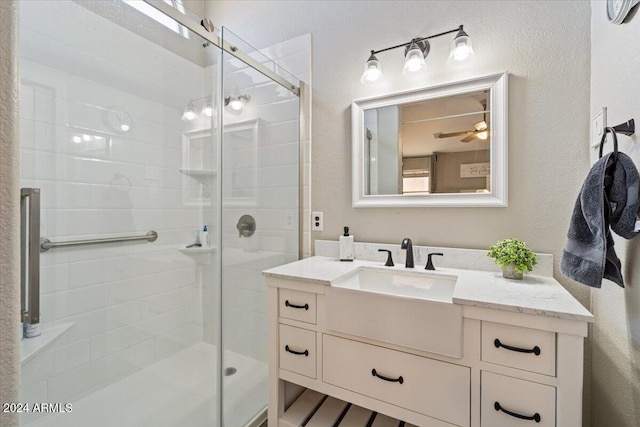 bathroom with vanity and an enclosed shower