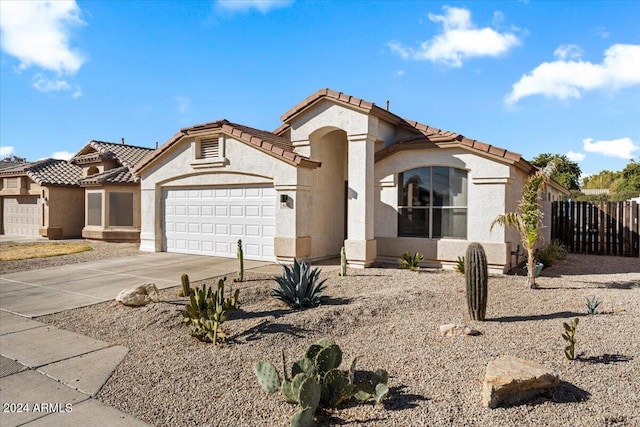 view of front of property featuring a garage