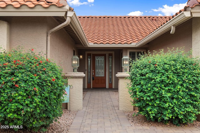 2461 Leisure World, Mesa, AZ 85206 - property entrance with a tile roof and stucco siding