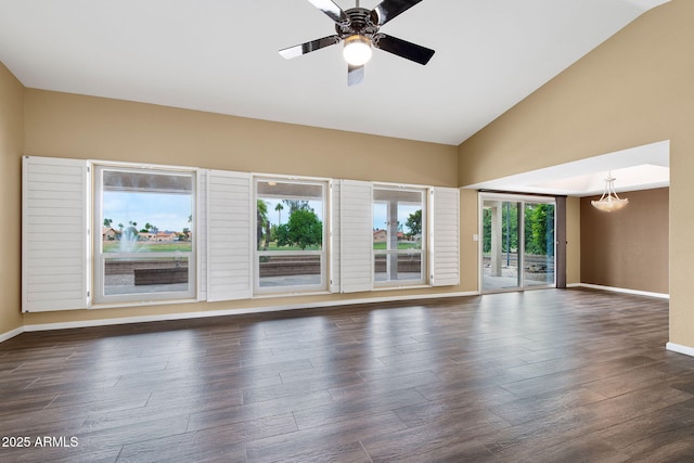 2461 Leisure World, Mesa, AZ 85206 - empty room with dark wood-type flooring, high vaulted ceiling, baseboards, and a ceiling fan