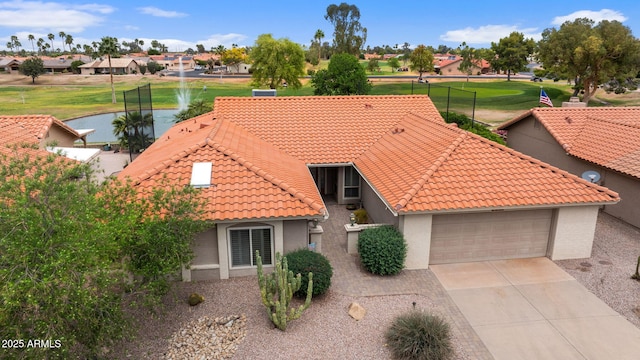 2461 Leisure World, Mesa, AZ 85206 - view of front facade featuring a garage, stucco siding, concrete driveway, and a tile roof