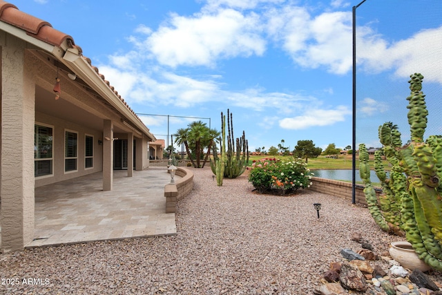 2461 Leisure World, Mesa, AZ 85206 - view of yard featuring a patio area and a water view