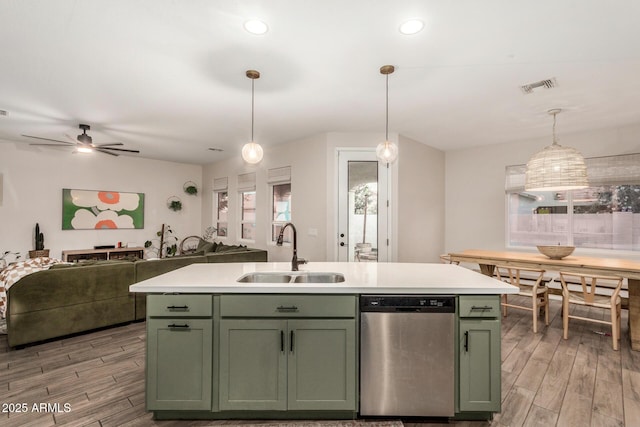 11541 E Corbin Ave, Mesa, AZ 85212 - kitchen featuring green cabinets, stainless steel dishwasher, a sink, light wood-style flooring, and recessed lighting