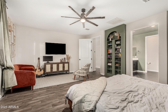 11541 E Corbin Ave, Mesa, AZ 85212 - bedroom with dark wood finished floors, baseboards, and ceiling fan