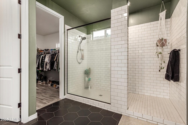 11541 E Corbin Ave, Mesa, AZ 85212 - full bathroom featuring tiled shower, tile patterned floors, and a spacious closet