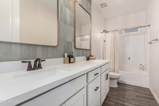 11541 E Corbin Ave, Mesa, AZ 85212 - full bathroom with toilet, wood finished floors, double vanity, and shower / tub combo