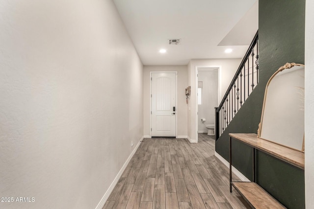 11541 E Corbin Ave, Mesa, AZ 85212 - foyer featuring wood finished floors, baseboards, recessed lighting, and stairway