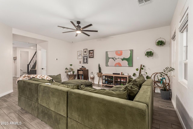 11541 E Corbin Ave, Mesa, AZ 85212 - living room with ceiling fan, wood finished floors, stairway, and baseboards