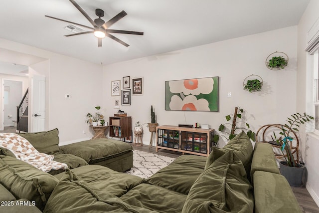 11541 E Corbin Ave, Mesa, AZ 85212 - living room with ceiling fan, baseboards, and wood finished floors