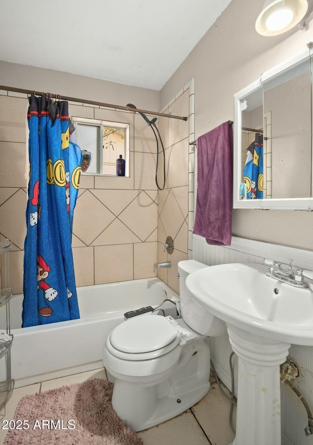 full bathroom featuring toilet, shower / tub combo, and tile patterned floors