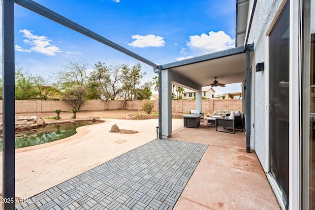 view of patio / terrace featuring a fenced backyard, an outdoor hangout area, and a ceiling fan