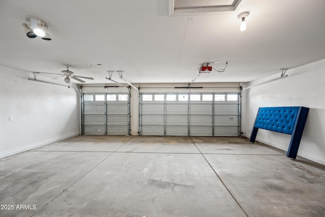 garage featuring baseboards and a garage door opener