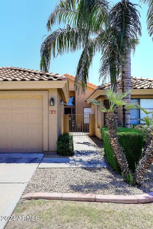 view of front of home with a garage