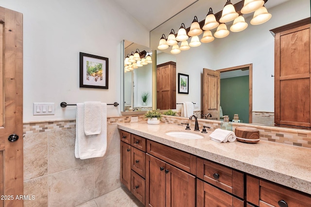 bathroom featuring vanity, tile walls, and tile patterned floors