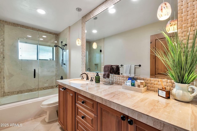 full bathroom with combined bath / shower with glass door, decorative backsplash, tile patterned flooring, vanity, and toilet