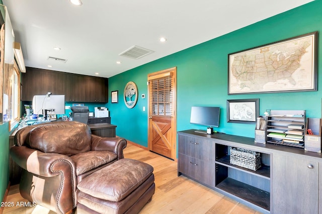 living room featuring light hardwood / wood-style floors