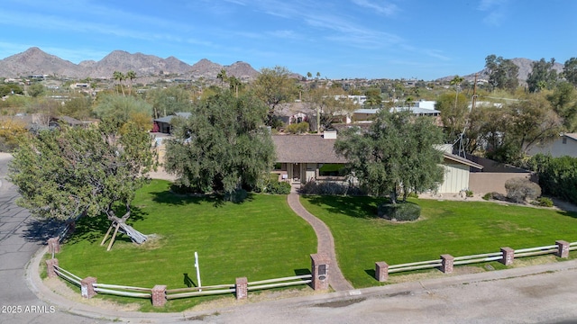 birds eye view of property featuring a mountain view