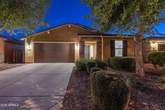 ranch-style house featuring a garage