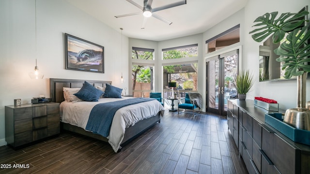 bedroom with wood tiled floor, a ceiling fan, and french doors