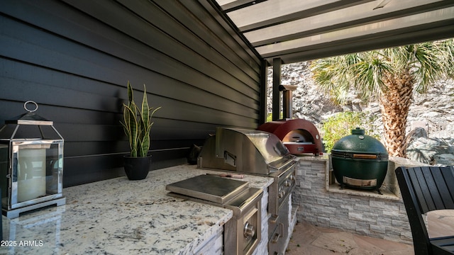 view of patio / terrace with a grill and area for grilling