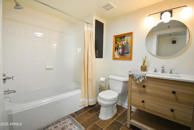 full bathroom with shower / bath combo, toilet, and vanity