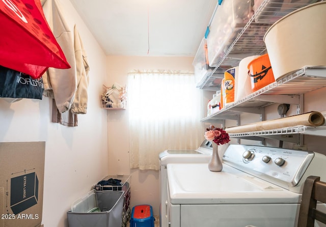 washroom with independent washer and dryer