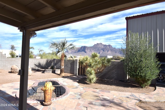 view of patio / terrace featuring a mountain view