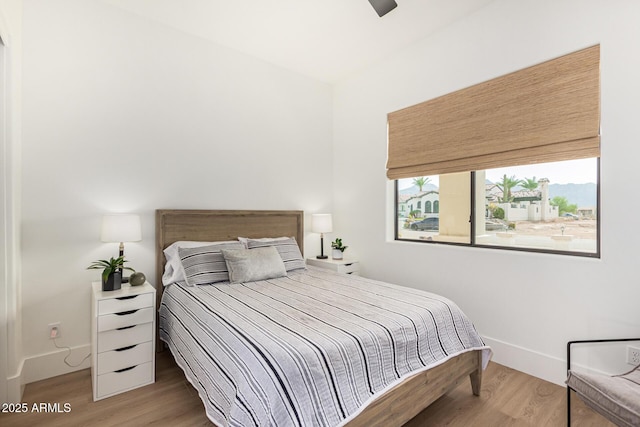 bedroom featuring hardwood / wood-style floors