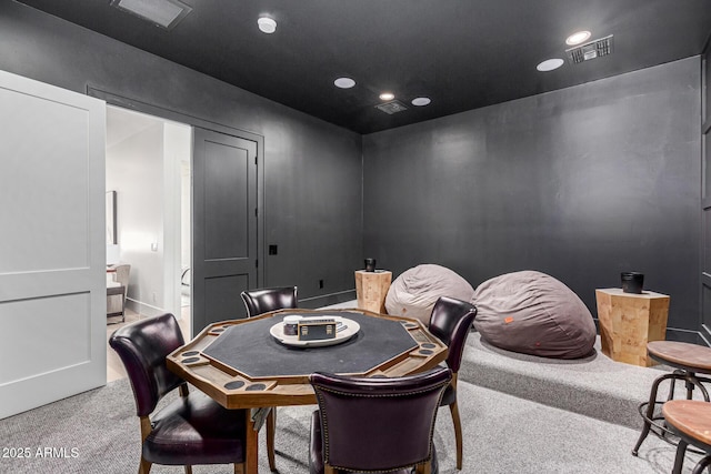 dining room featuring light colored carpet