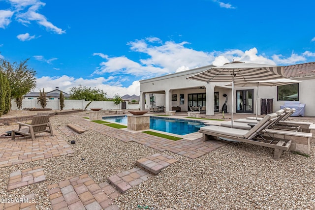 view of pool with a patio area