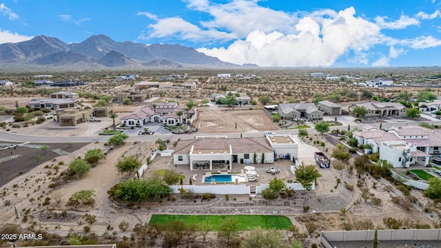 drone / aerial view featuring a mountain view