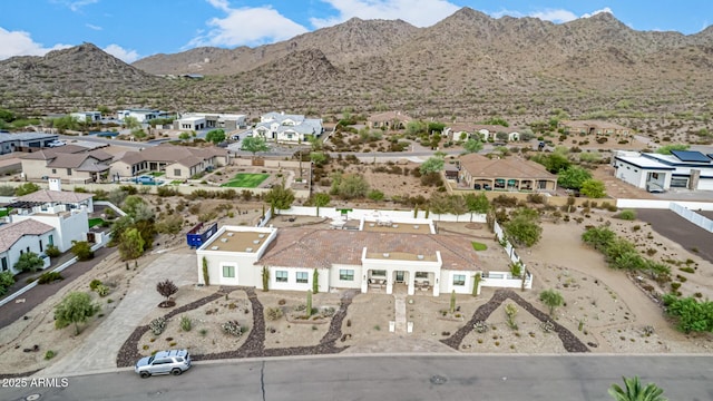 drone / aerial view featuring a mountain view