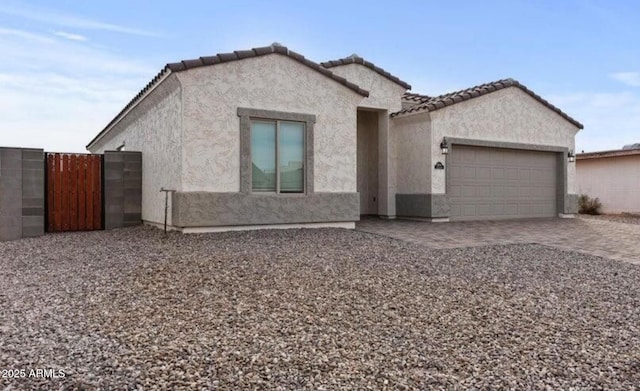 view of front of property with a garage