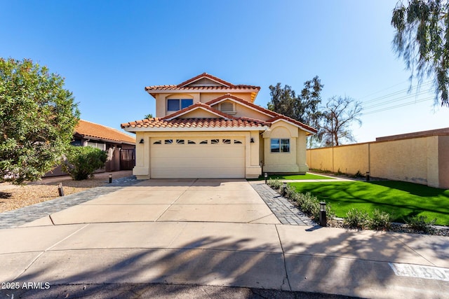 8807 E Dahlia Dr, Scottsdale, AZ 85260 - mediterranean / spanish home featuring fence, a tile roof, a front yard, stucco siding, and driveway
